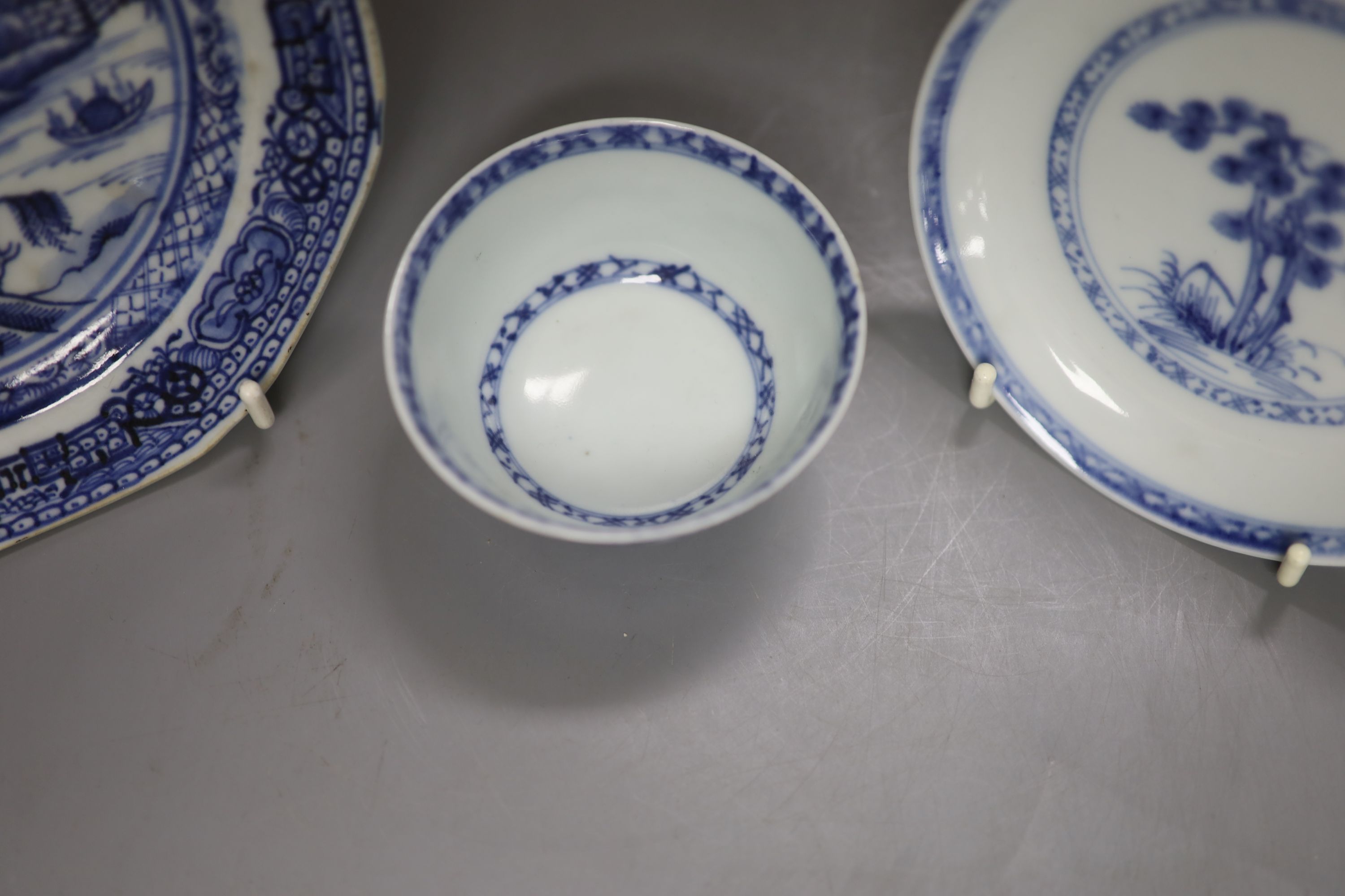 A Chinese 18th century Nanking Cargo blue and white tea bowl and saucer and a small blue and white octagonal plate, W 16cm (plate)